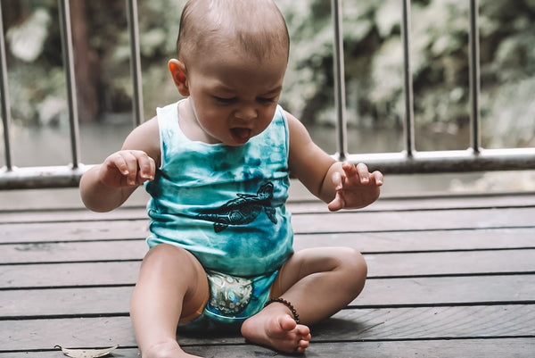 Hand dyed and hand stamped Under the Sea (turtle) Onesie